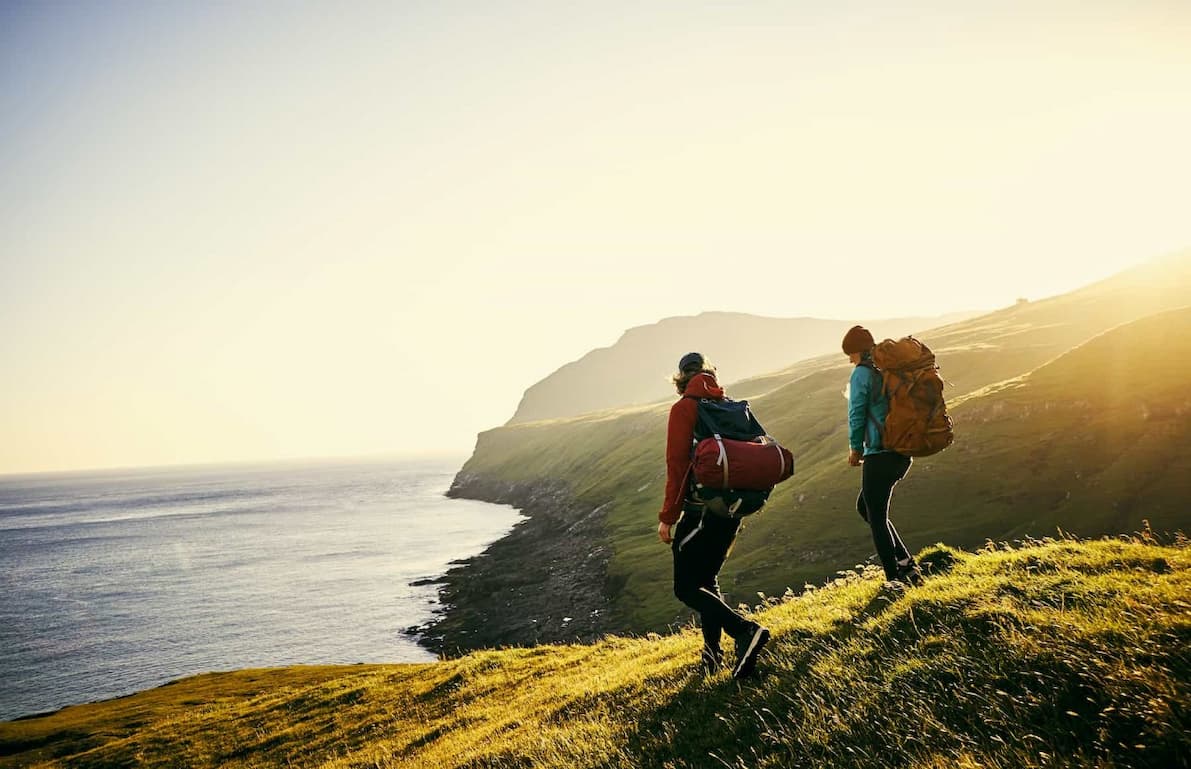 Hikers hiking on cliffs