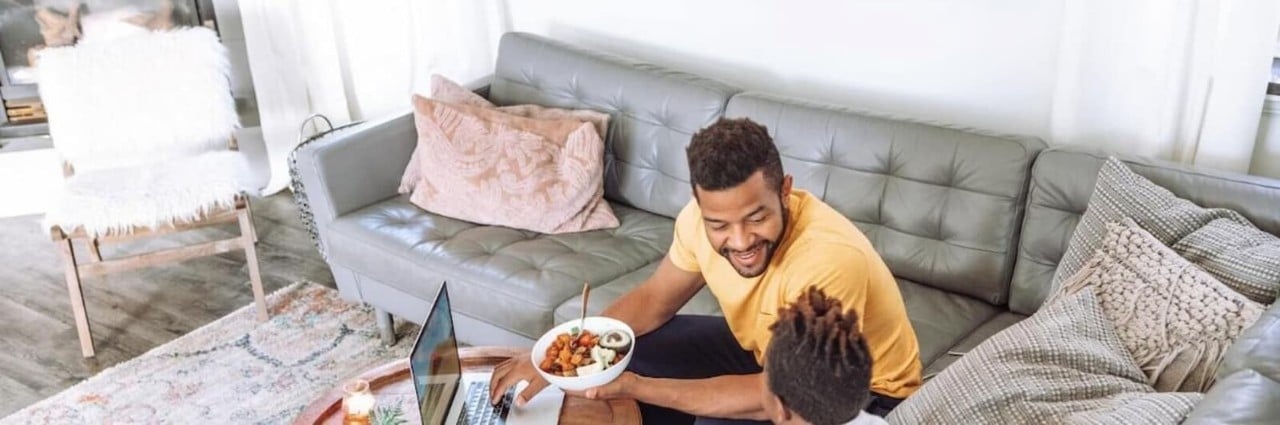 family eating snacks in living room