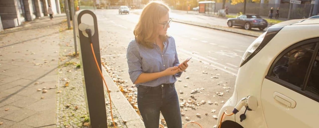 Woman at charging point