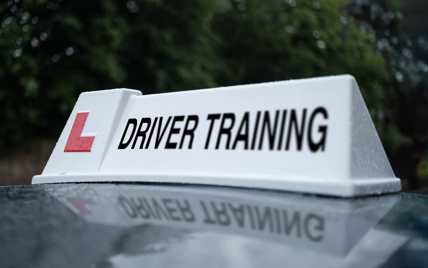 driving training sign on instructors car