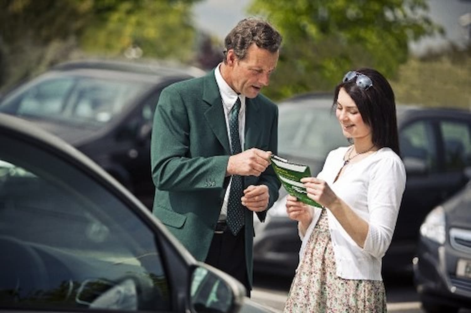 Car dealer and woman