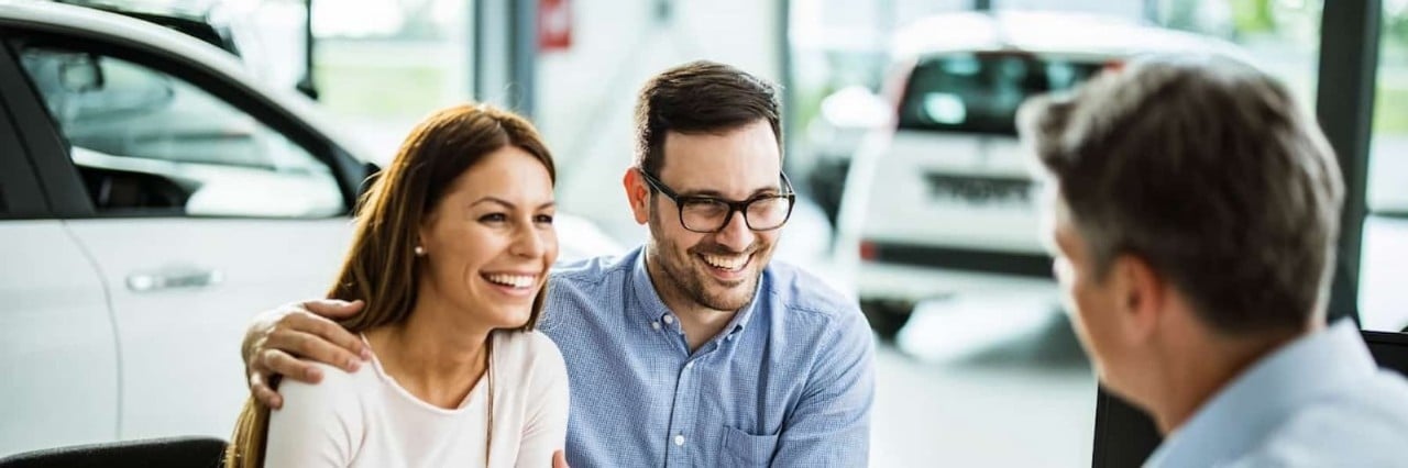 couple buying new car
