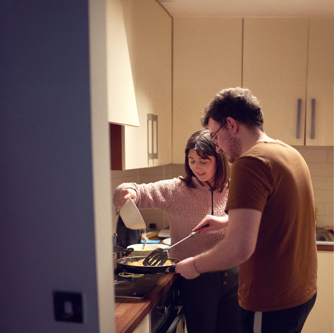 Couple cooking at home 