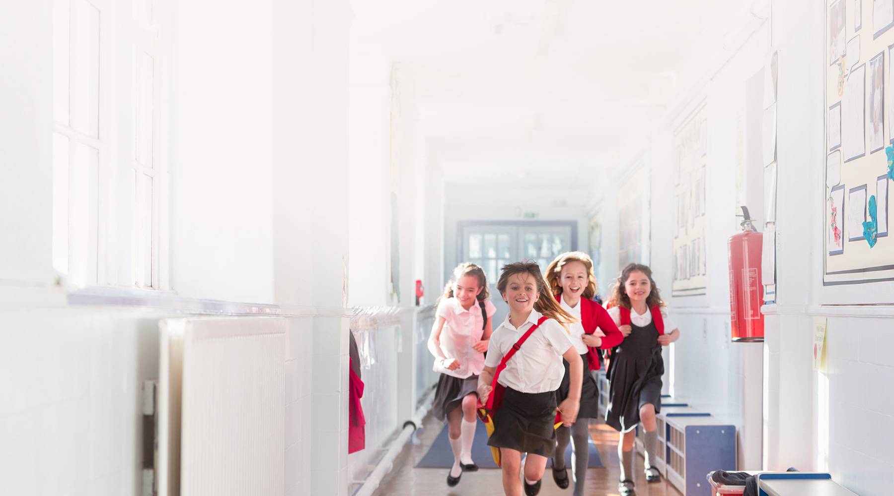 School classmates entering room