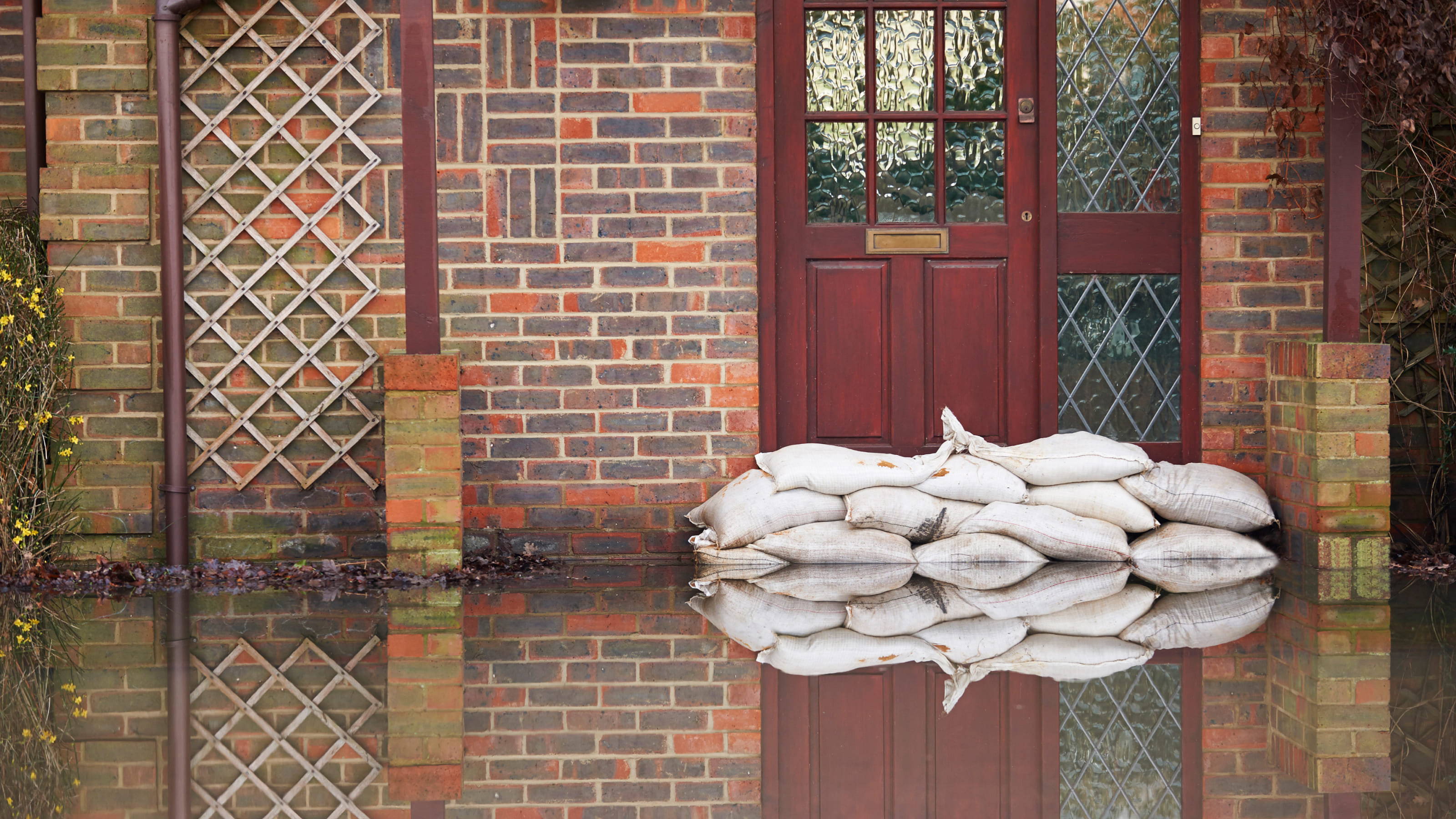 flood bags protecting house from flood